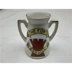 Twelve crested china models of WW1 tanks by Grafton, Arcadian and Carlton china etc with crests from Caistor Lincs, Saffron Walden, Paignton, Evesham etc  , together with a crested china model of the R.M.S Lusitania with New Brighton crest and a two-handled vase for 'The Forts Boxhill' (14)