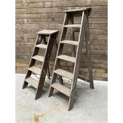 Two antique wooden step ladders, H100cm and 140cm
