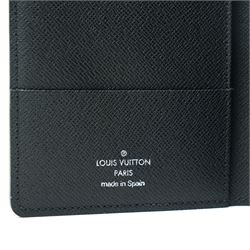 Louis Vuitton Damier Graphite canvas passport holder, the black and grey checkerboard exterior opening to a crossgrain leather interior with card slots and slip pockets, stamped Louis Vuitton Paris and made in Spain, together with original Louis Vuitton box and dust cloth