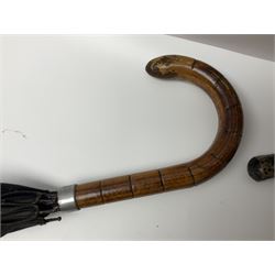 Early 20th century curved horn handle walking stick with hallmarked silver mounts, engraved L Russell 1918, together with a shooting stick by William Mills Birmingham, with leather handle, 'The Featherwaite' shooting stick and an umbrella with wooden handle