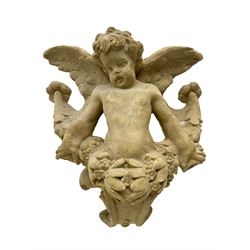 Sandstone finish moulded fibre-glass wall mounting figure of a winged cherub