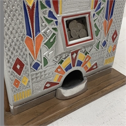 A one arm bandit fruit slot machine, the oak case with cast metal front and top with polychrome detail, with jackpot windows and single pull arm, patent no to front, H62cm. 