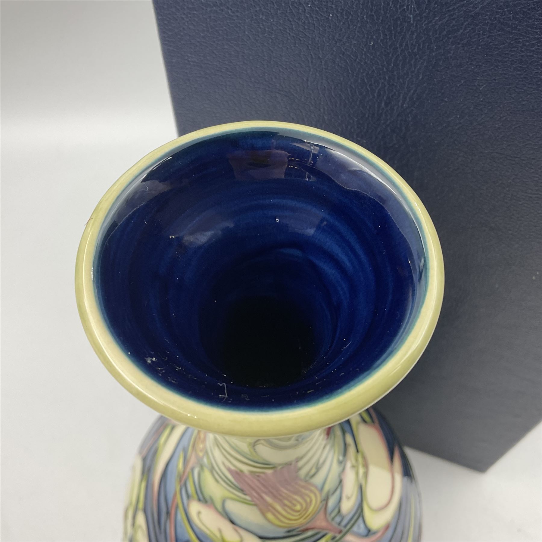 Moorcroft vase, of bottle form, decorated in the Orchid Arabesque pattern by Emma Bossons, circa 2002, H31.5cm, with original box 