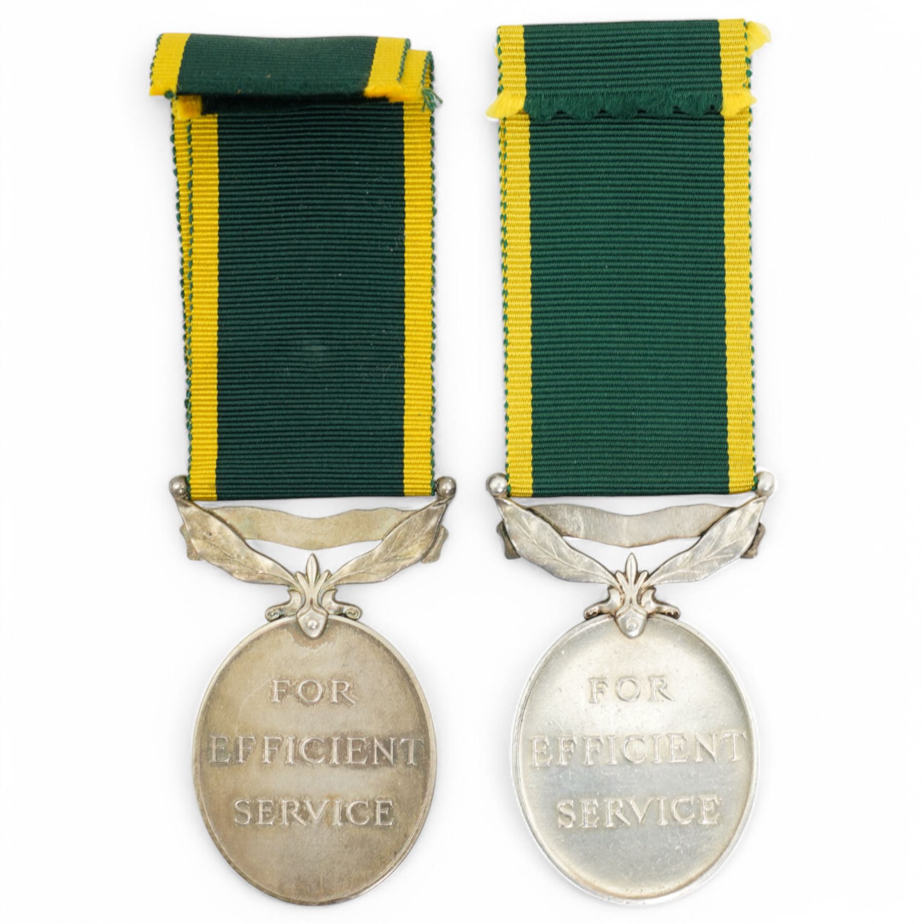 To: 3767879 Dvr H.H. Riley R.E, Territorial Efficiency Medal in box of issue and another to 4077599 Rfn. J.H.Hannam R.B.