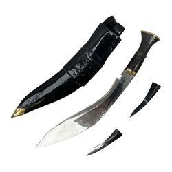 Ceremonial kukri, the 28.5cm curving blade inscribed 'O RDEP NEPAL 9/81' with brass mounted horn grip; in gloss black scabbard with two skinning knives 41cm overall