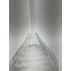 Collection of 19th century and later pharmaceutical laboratory glass, to include, large filter funnel, graham condenser, conical flask, bell jar and another with graduated tube, Provenance: discovered in the storeroom of a long established Hull pharmacist and opticians