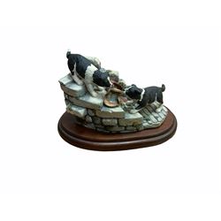 Border fine arts figures, Pick of the litter, model no JH30, by Ray Ayres L26cm, Tug of war, model no JH61, by D Walton H11.5cm and Robin with chicks in boot, model no RB45, by by Ray Ayres H11cm.  