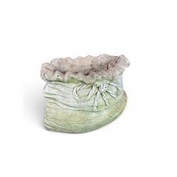 Four cast stone garden planters in the form of ribbon tied planting sacks