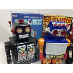 Three vintage battery operated robots comprising tin-plate Space Walk Man ME 100 Robot, Saturn the 13