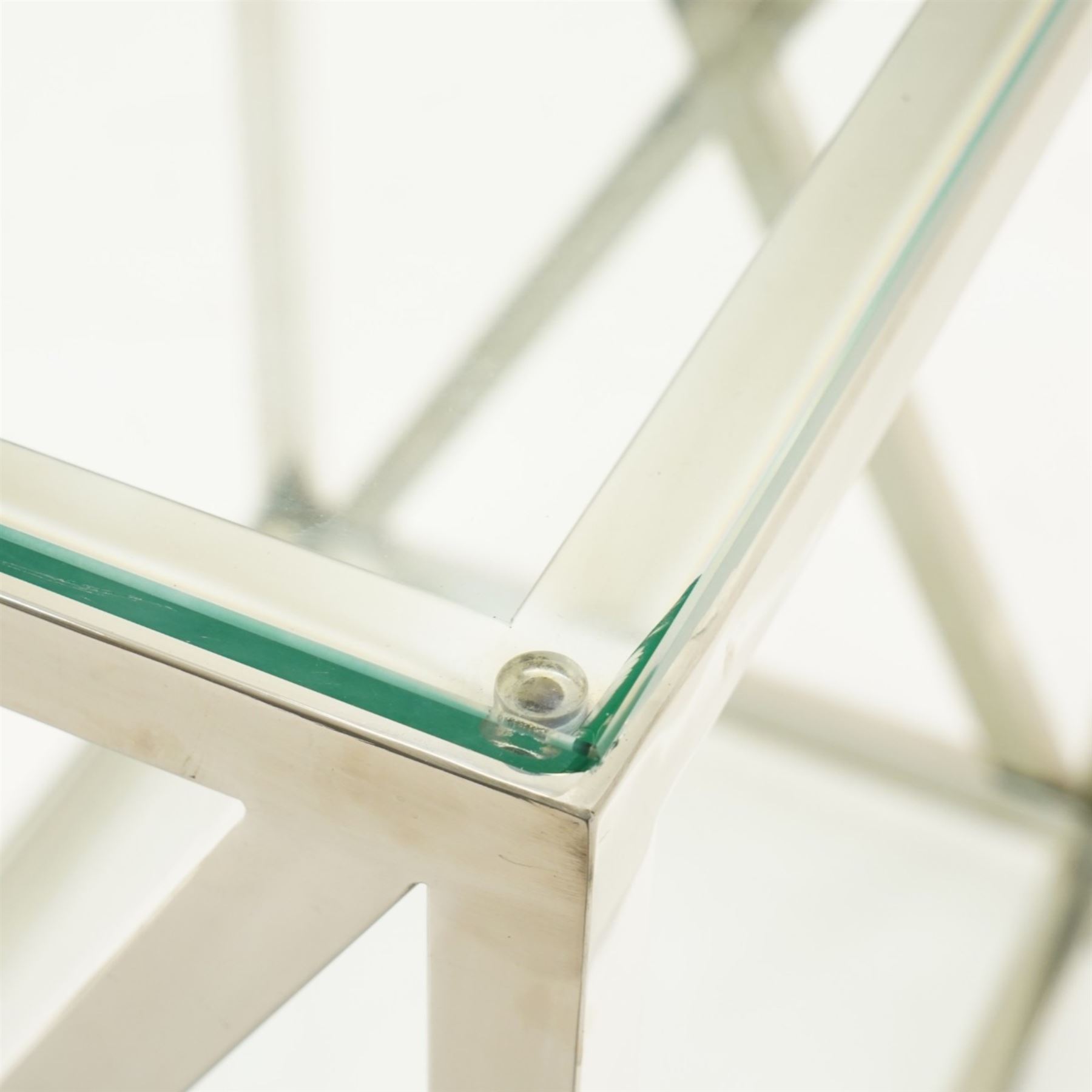 Pair of modern chrome lamp tables, rectangular plate glass top on polished chrome frame, the sides formed with X-frame stretchers, raised on square supports with lower glass tier 