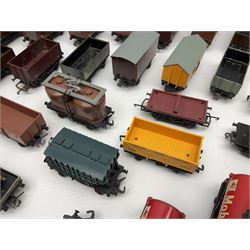 Hornby Dublo - forty-three goods wagons including nine tank wagons (Esso, Mobil, Vacuum, UD and Traffic Services), brake vans, meat and fish wagons, bogie well and bolsters, cable drums, open wagons, salt and grain wagons, etc; and six others by Tri-ang etc; all unboxed (49)