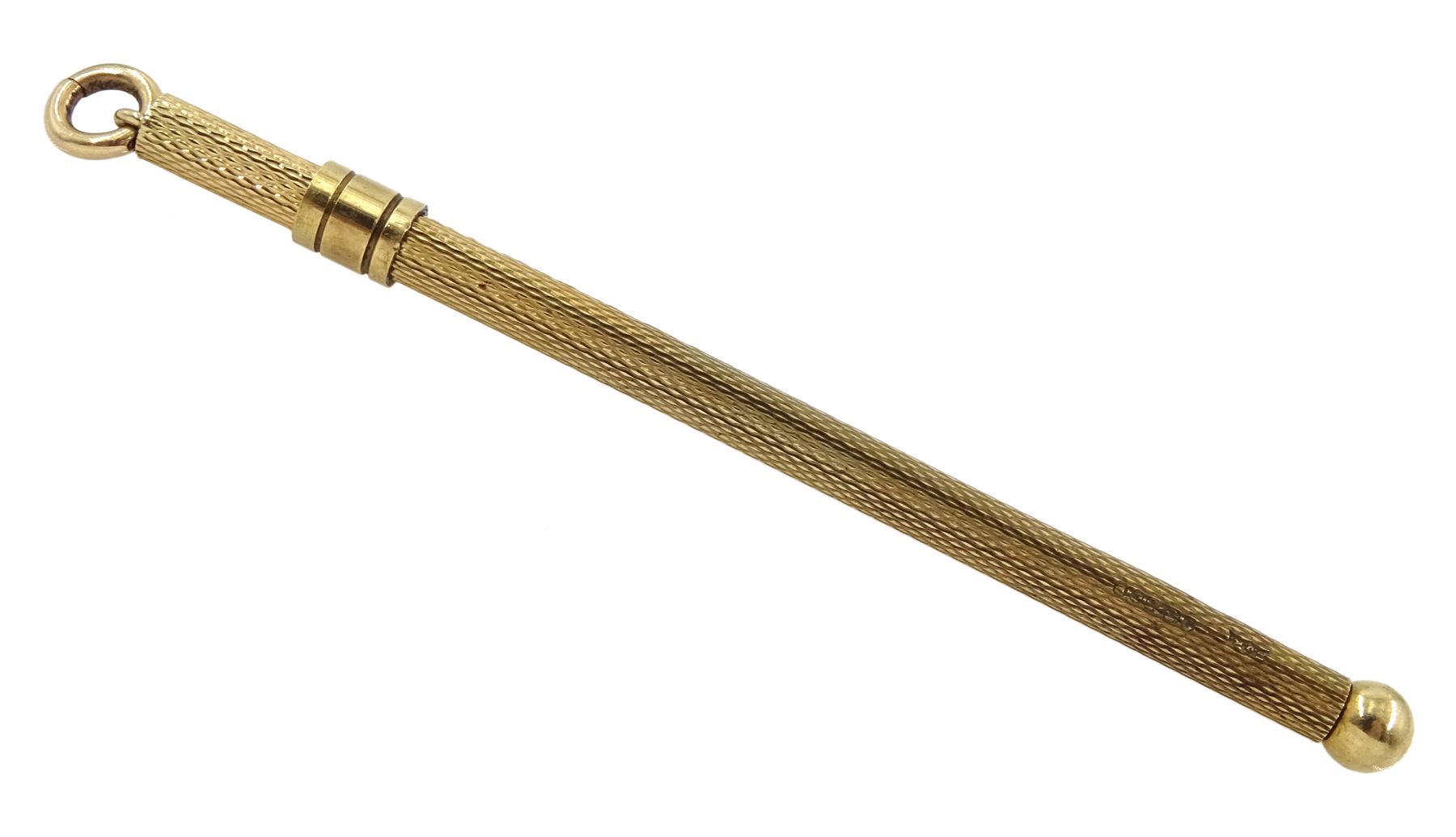 9ct gold propelling cocktail swizzle stick, hallmarked