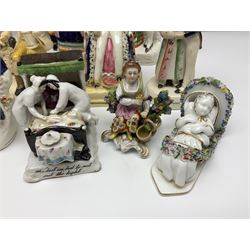 Collection of Victorian and later Staffordshire style figures, to include Prince Albert, the royal children, spilt vases etc, together with Victorian fairings