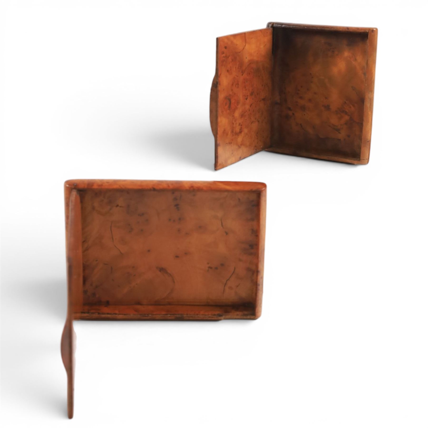 Three cigarette cases, modelled as bank notes, together with a smokers set including ashtray, cigarette case, ligher and cigarette holder, cased and other cigarette holders 