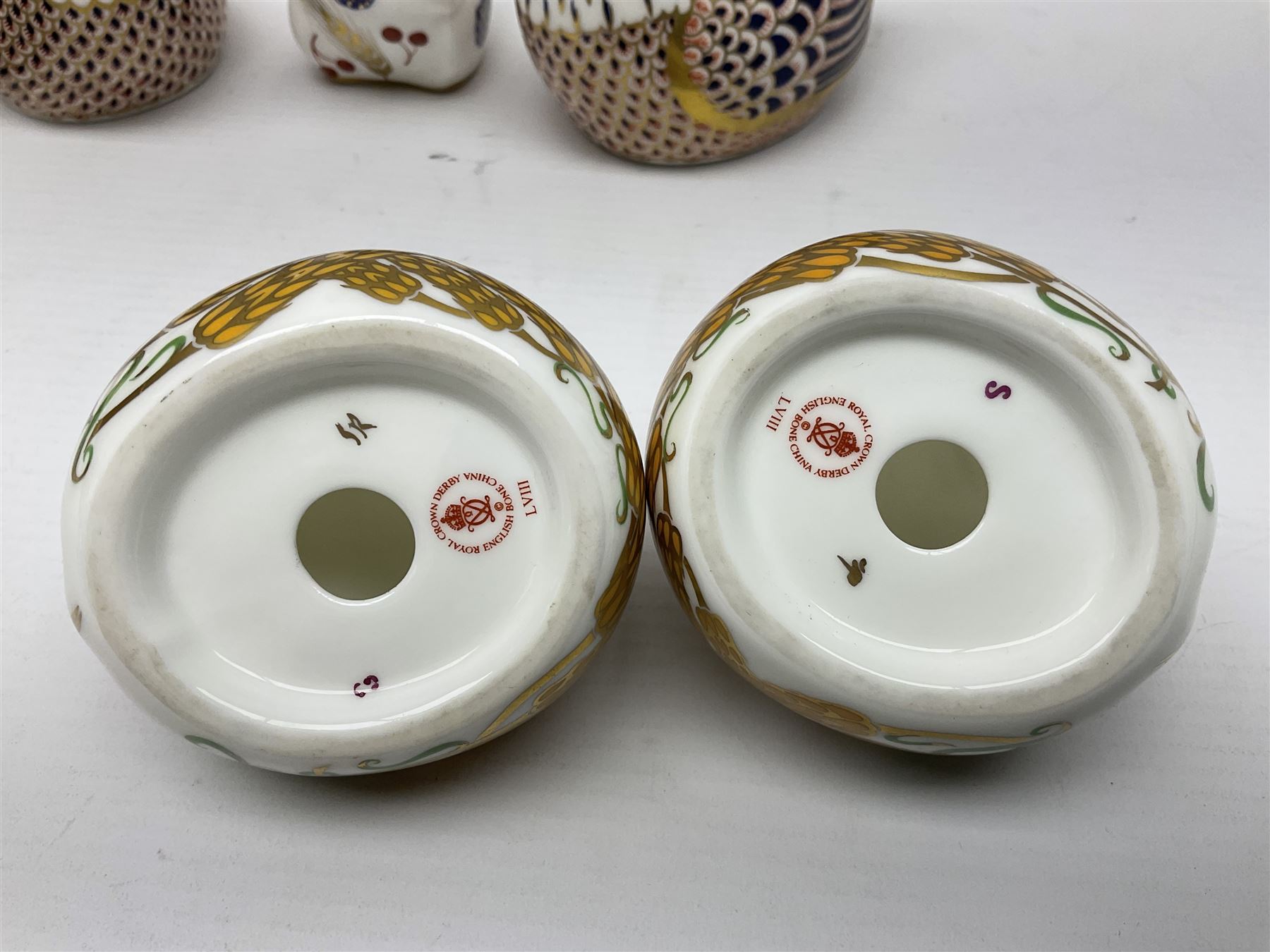 Seven Royal Crown Derby Paperweights, to include Field mouse with silver stopper, Dormouse, Chicken etc,  six without stoppers   