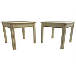 Late 20th century cream painted coffee table, rectangular top with glass inset, on square moulded supports with inner chamfer (W100cm D50cm H44cm); and a pair of matching square lamp tables (W50cm D50cm H44cm)