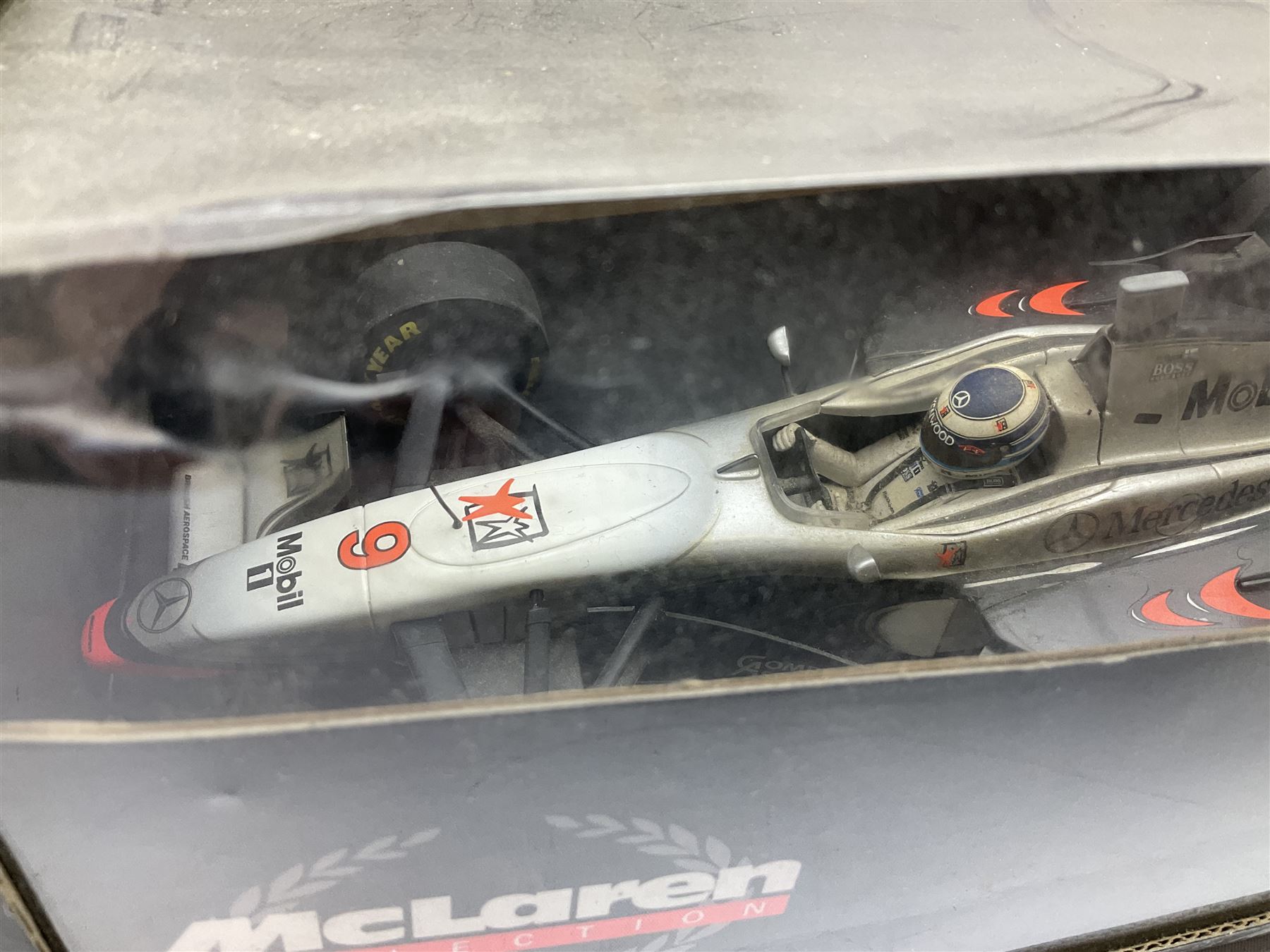 Two Collezione Classico large scale die-cast models of a Ferrari 1972 312P with Racing Fuel Pump and Ferrari 1958 250 Testa Rossa with Road Fuel Pump; and two Minichamps 1:18 scale models of a McLaren Mercedes Racing Car and Auto Union Typ C racing car; all boxed (4)