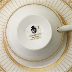Wedgwood 'Colonnade' pattern dinner and tea service comprising twelve dinner plates, twelve dessert plates, nine soup bowls and stands, pair of covered vegetable dishes, sauce boat and stand, eight tea cups and saucers, thirteen tea plates, milk jug and sugar bowl
