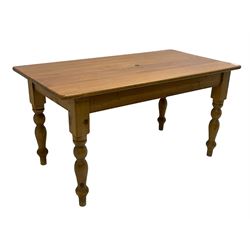 Polished pine farmhouse design dining table, rectangular top on turned supports 