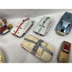 Various makers - large quantity of unboxed, playworn, incomplete and repainted TV and film related die-cast models including Dinky Maximum Security Vehicles, Corgi 007 Moonbuggys, USS Enterprise, Corgi James Bond Aston Martin and other vehicles, Corgi Magic Roundabout, Chitty Chitty Bang Bang, Batmobile etc, SPV, Basil Brush etc