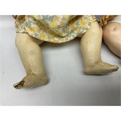 Carl Harmus Germany bisque head doll with applied hair, sleeping eyes, open mouth with teeth and composition body with jointed limbs; marked 'Harmus 313.4/0 Germany' H38cm; and Alt, Beck & Gottschalk Germany bisque head doll with applied hair, fixed eyes, open mouth with tongue and composition body with jointed limbs H44cm (2)