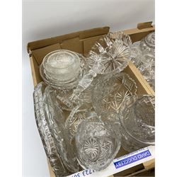 A group of assorted Victorian and later glassware, comprising largely cut glass, to include various bowls, lidded jars, candlesticks, vases, etc. 