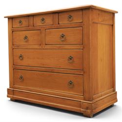 Solid oak chest, fitted with an arrangement of five short and two long drawers