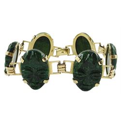 Gold oval link green/yellow hardstone mask bracelet, stamped 9ct