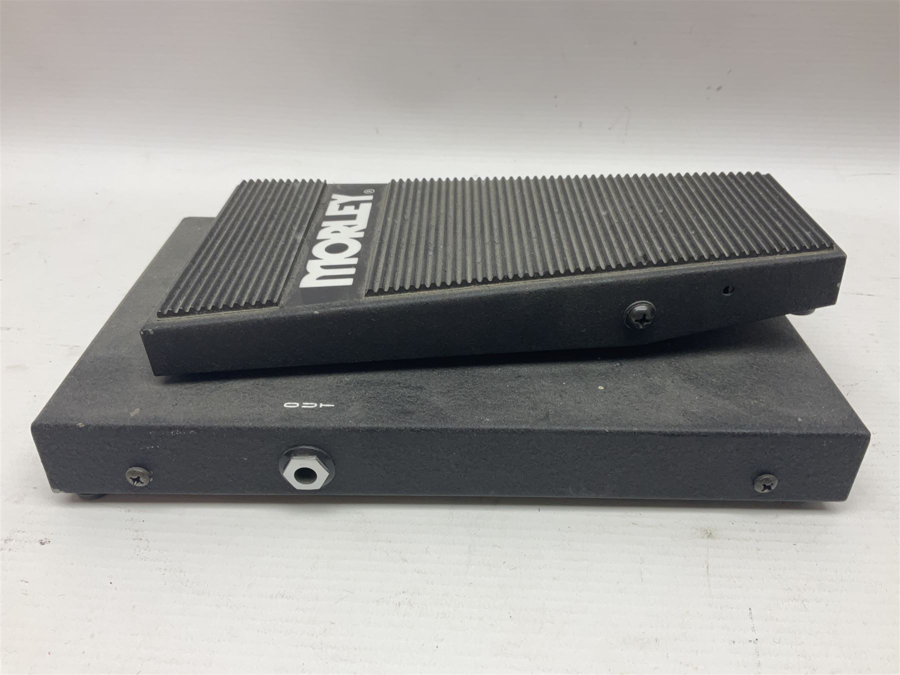 Three Morley guitar effects pedals, including The Little Alligator Volume serial no 195408 and Dual Bass Wah model PBA-2