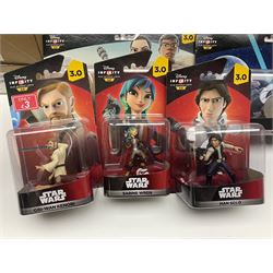 Star Wars - Disney Infinity - six Play Sets for The Force Awakens (five identical) and Rise Against The Empire; and twelve carded figures; all in unopened blister packs; and two other items (19)