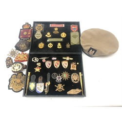  Territorial SAS cap by Compton Webb, WO1 arm badge, and wrist band, WO2 (QMSI) wrist band, Irish Guards badges etc, etc, two framed displays of various GB and Foreign Army badges, incl. Wound Badge, Guards Polo Club fob tank emblem, Russian, Cuba, German etc   