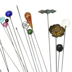 Collection of early 20th century and later hat pins including six silver mounted examples by Charles Horner, pique work, faceted class, jet acorn, filigree etc