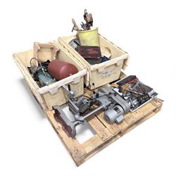 Collection of workshop tools including bench drill, grinding wheel and hand tools