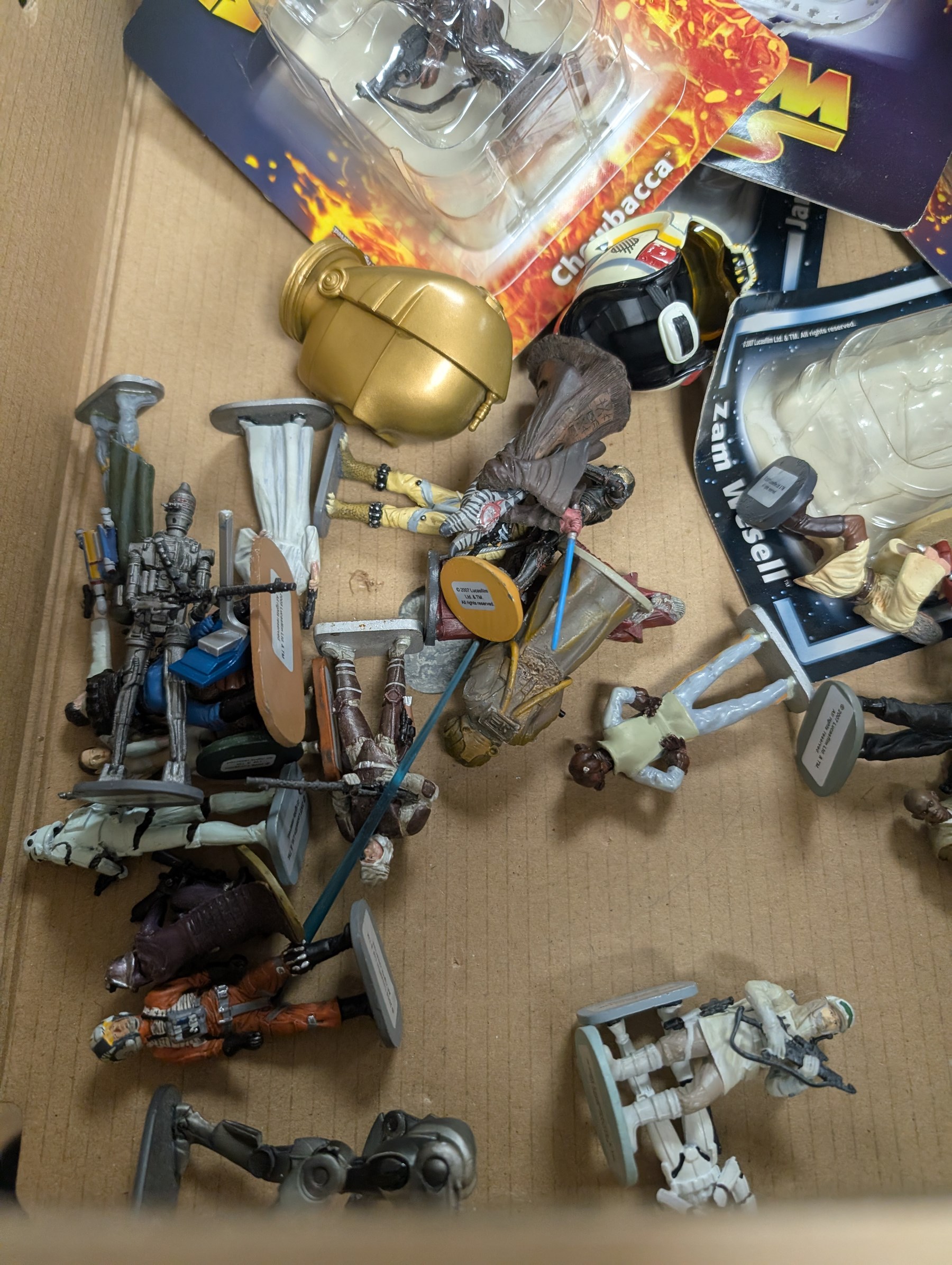 Collection of DeAgostini Star Wars figures, including two limited edition Darth Vader figures, diecast vehicles and figures and miniature helmets