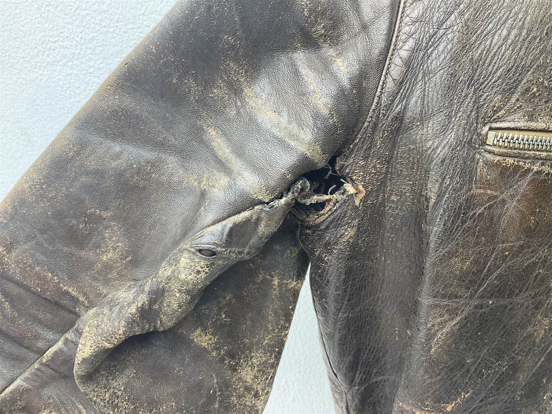 German Luftwaffe Hartmann leather jacket with tartan pocket linings, pocket zip pulls marked 'Eclair Bte.S.G.D.G.'