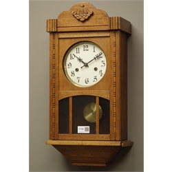 20th century wall clock with glazed door, circular dial twin train movement striking the hours on a coil, h52cm   