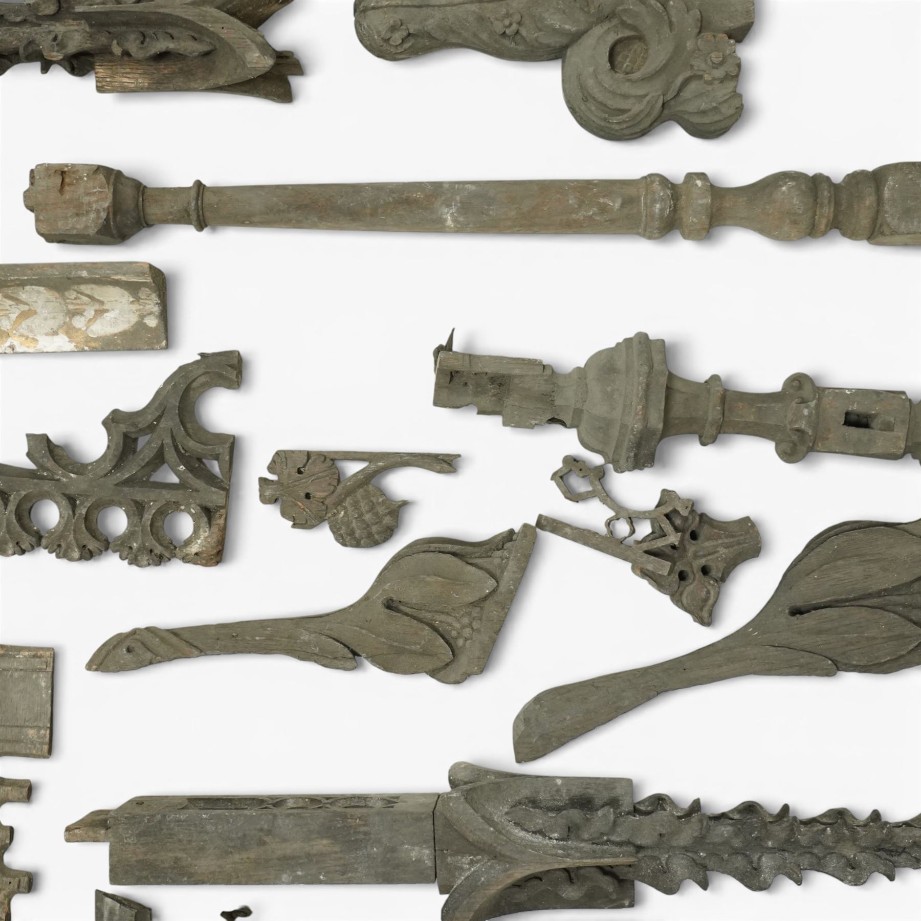 Architectural Salvage - Collection of oak ecclesiastical carvings, 19th century, comprising various finials, including four crocketed examples, some with fruit and foliate carved motifs, corbel, and others
Notes: Removed in the 19th century from the church in the grounds of a private Yorkshire estate 
Provenance: property of a Nobleman