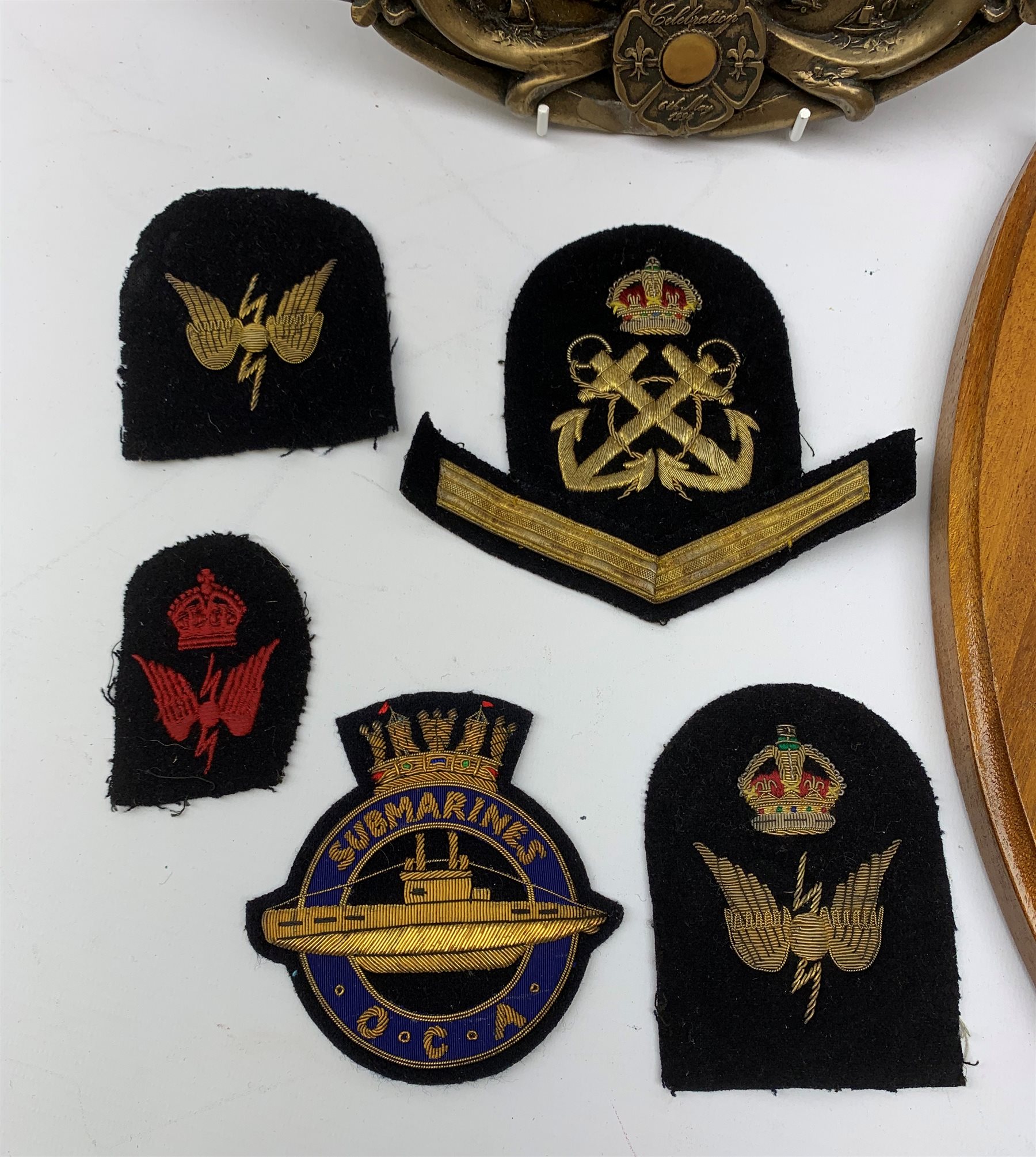  Two Submarine Force US Atlantic Fleet presentation plaques, the first detailed Subron 14, the second USS Abraham Lincoln 602, each H32.5cm, together with five uniform patches, four cap tallies, detailed HSM Tamar (x3), and HMS Ganges, and a set of two limited edition Euro Tunnel commemorative presentation plaques, The Breakthrough 1st December 1990 and Celebration 6th May 1994, D27cm, complete with original certificates.  