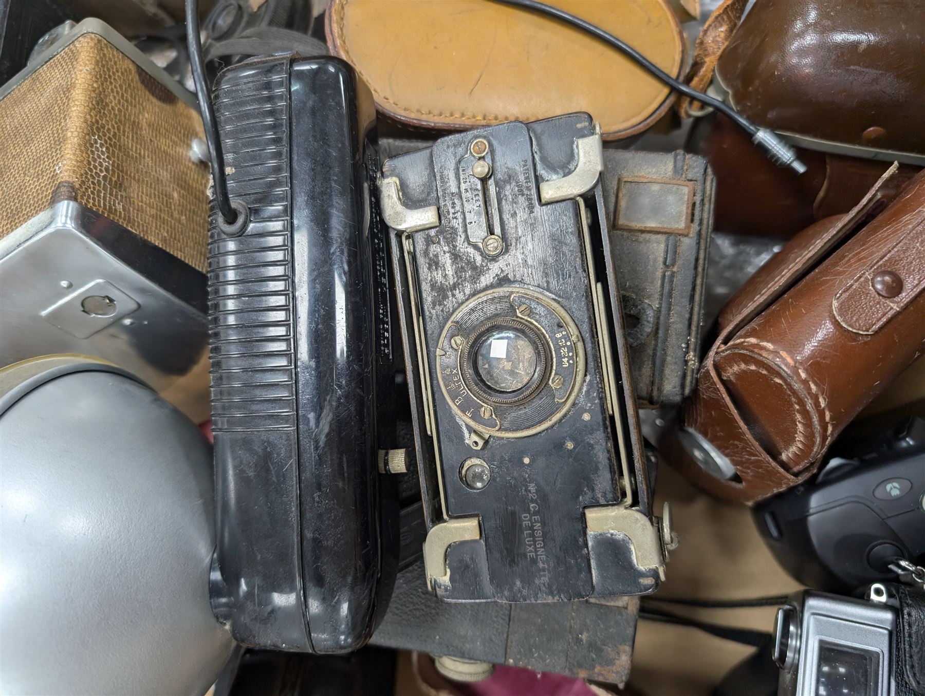 Collection of vintage cameras, including Minolta Hi-Matic 7S, No.2 C. Ensignette Deluxe, Zeiss Ikon etc