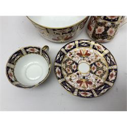 Royal Crown Derby 2451 Imari pattern, comprising four cups and saucers, milk jug, dish and another cups and saucer, all with printed marks beneath  