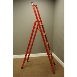  Wooden and red painted metal step ladders   