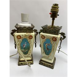 A pair of Japonesque vases, later converted to table lamps, each of square sided tapering form decorated with panels of lizards, birds and insects, with metal mounted bases and collars with twin drop handles, not including fixtures H21cm 
