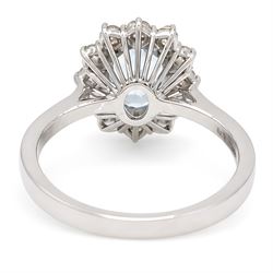 18ct white gold aquamarine and diamond cluster ring, single oval cut aquamarine of approx 0.85 carat, surrounded by twelve round brilliant cut diamonds, hallmarked, total diamond weight approx 0.50 carat