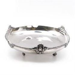 Egyptian silver bowl, of circular form, with oblique gadrooned rim and cast palmette decor...