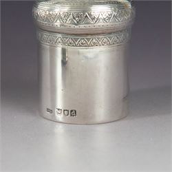 Late Victorian silver jar with cover, of cylindrical form with  domed cover engraved with initials, hallmarked Charles & George Asprey, together with a small ecclesiastical trinket box, engraved with cross to cover and with personal engraving beneath, hallmarked Edgar Ernest Davis, London 1944, taller jar H6cm