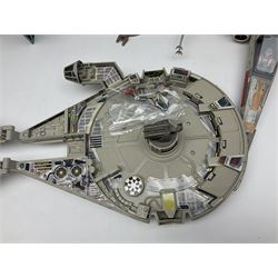 Star Wars - four space/land vehicles comprising Millenium Falcon with hinged top and figures; TIE Fighter; X-Wing Fighter with pilot; and AT-ST 'Chicken Walker' transporter; all unboxed (4)