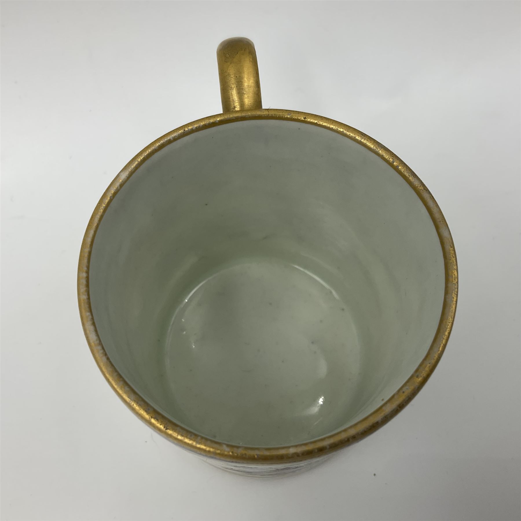 19th Sèvres style porcelain cup and saucer, the cup painted with a figural scene, against a scalloped border of scrolling floral swags on a blue ground, together with a Sèvres soft paste porcelain coffee can and saucer, painted with panels of exotic birds, roses and a border of cornflowers, LL monogram enclosing date letters H above painters mark, coffee can H6.5cm, saucer D13.5cm (2)