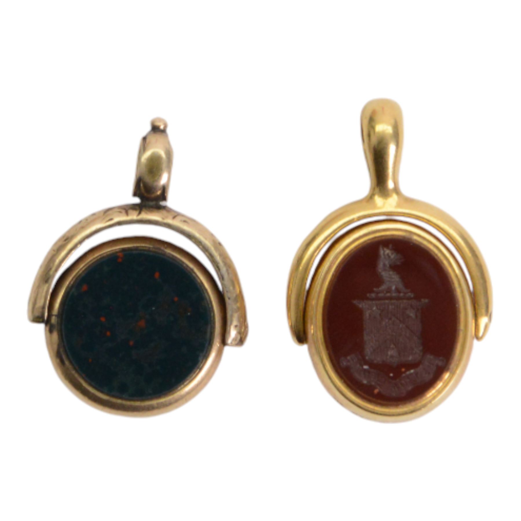 Two 19th century gold swivel fobs, the first 18ct example set with bloodstone and carnelian engraved with monogram and armorial, bearing hallmarks, the second 9ct example with bloodstone and chalcedony, set within simple mounts, each approximately H3cm 

Provenance: By family descent from the Chichesters of Arlington Court, Devon; from the collection of Andrew Chichester Everitt.
