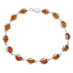 Silver Baltic amber ladybird link bracelet, stamped 925 