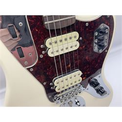 Mexican Fender Jaguar electric guitar with Humbucker pick-ups and tremolo arm, serial no.MX16741977, L101cm; in soft carrying case